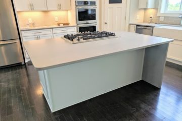 white farmhouse kitchen with island seating from Capitol Homes