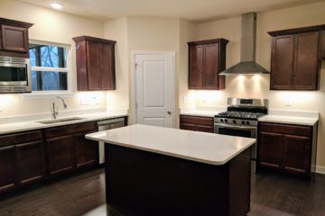 dark and white custom kitchen from Capitol Homes